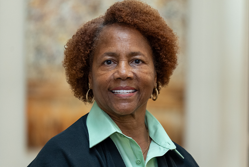 patient Deborah smiling. Hear her story.